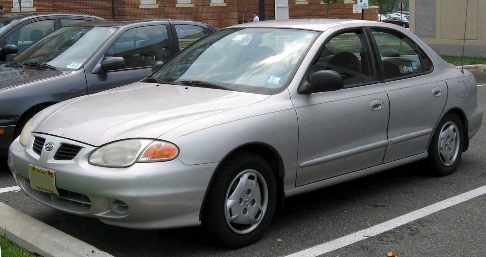 1996 sedan with rounded headlights and smooth front bumper