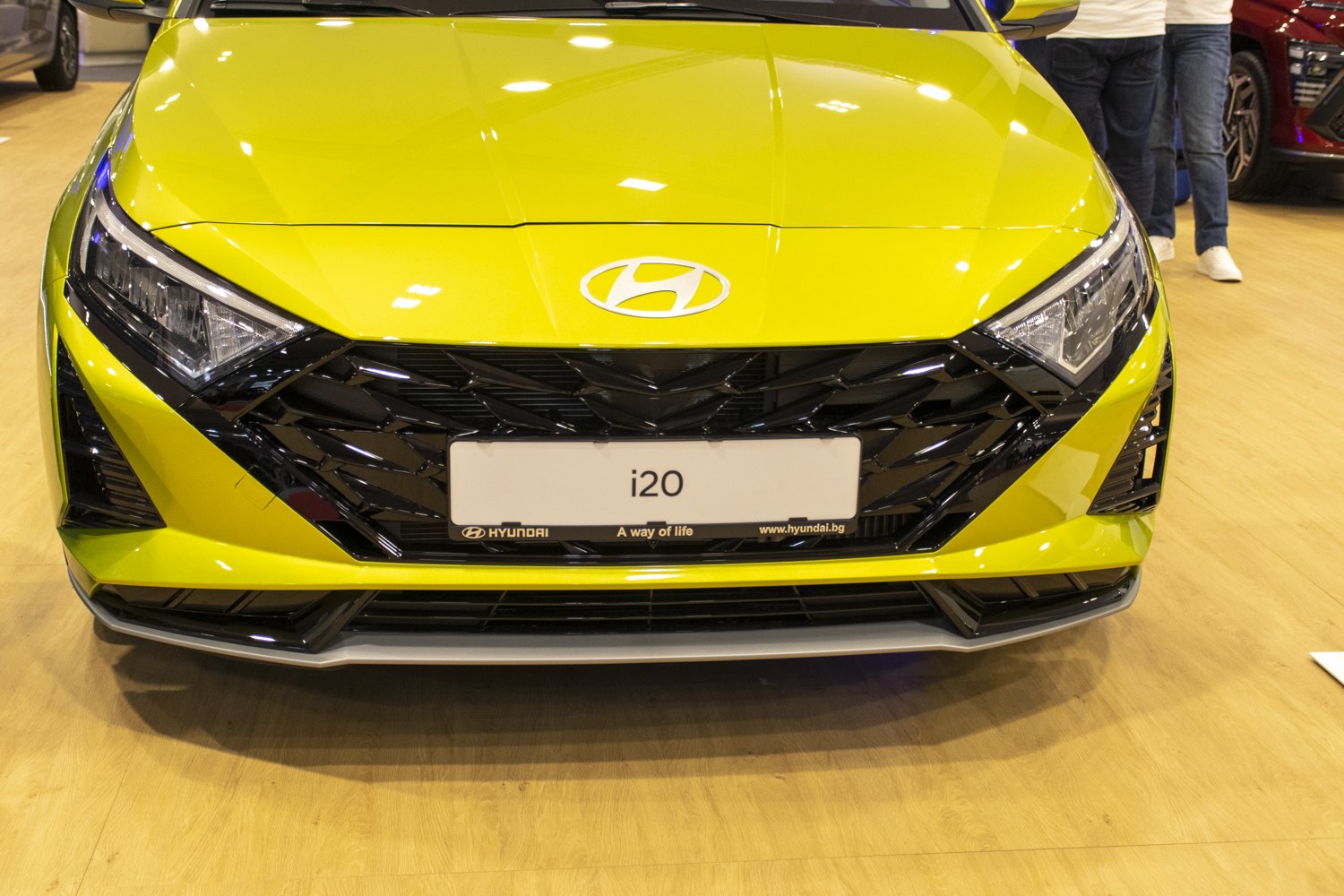 Front grille and LED headlights with black mesh grille and angular design