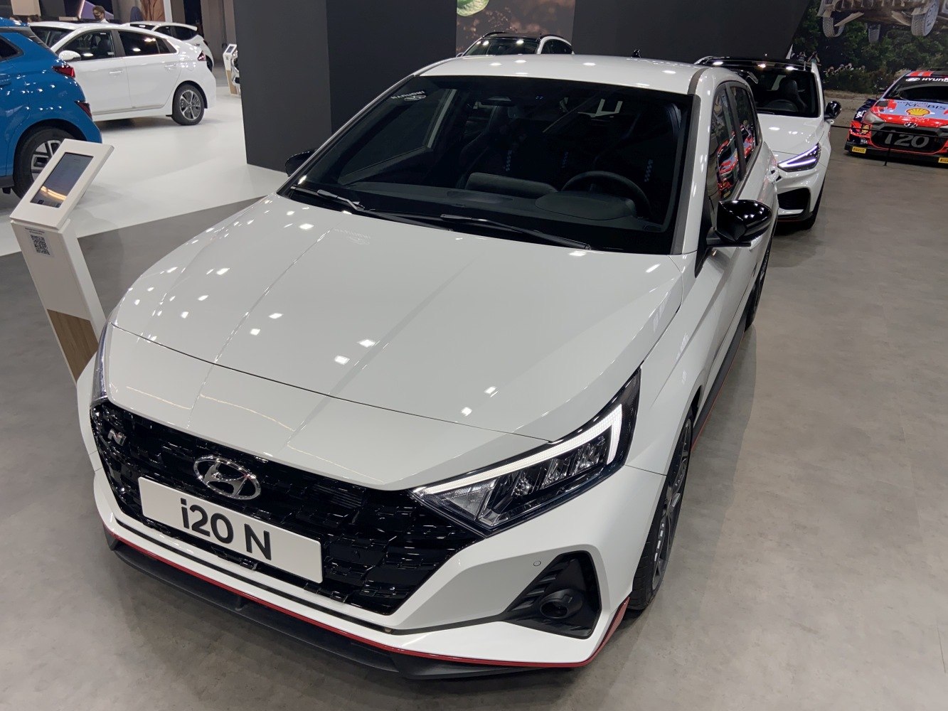 Front view with LED headlights and sporty black grille.