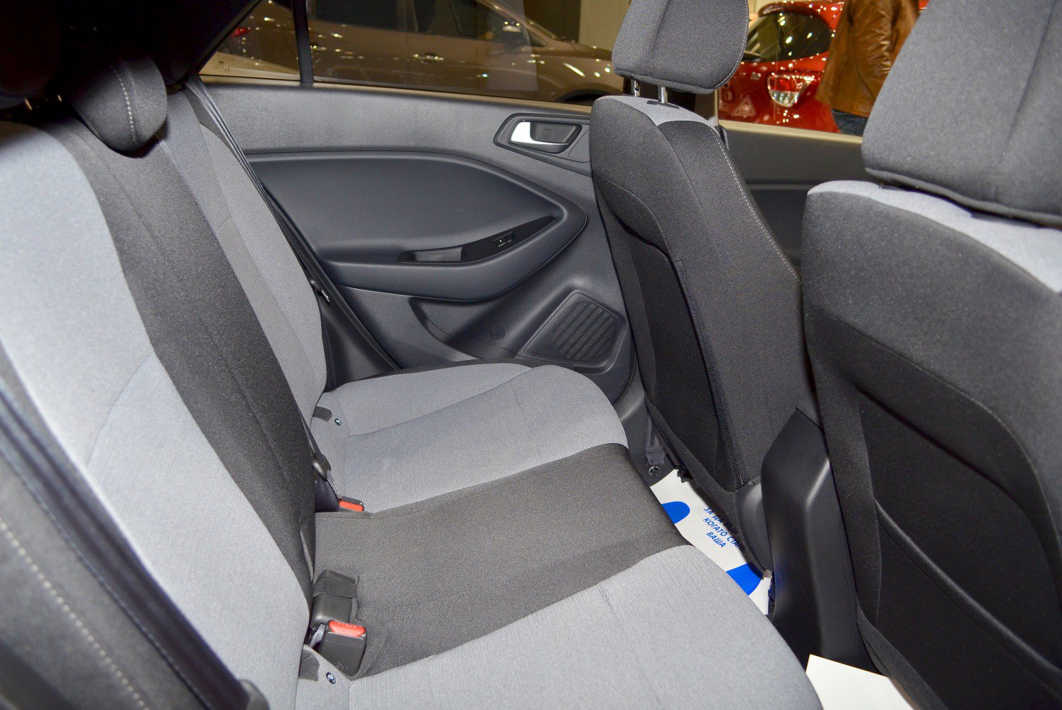 Rear fabric upholstery seats and door panel with window control