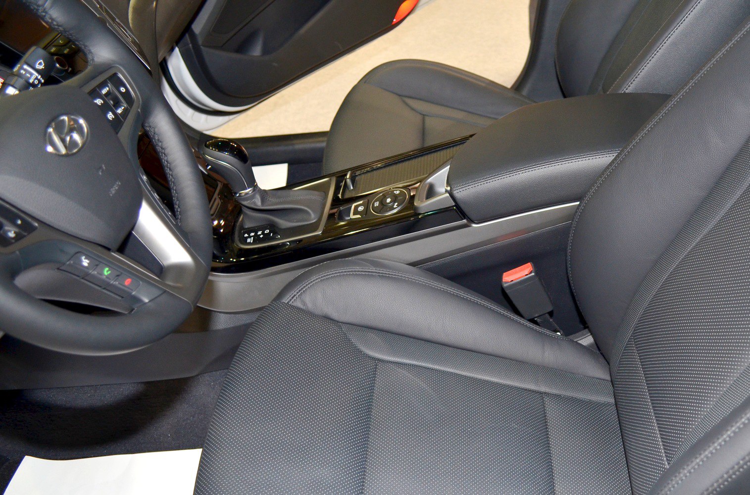 Leather seats, gearshift, center console with control buttons