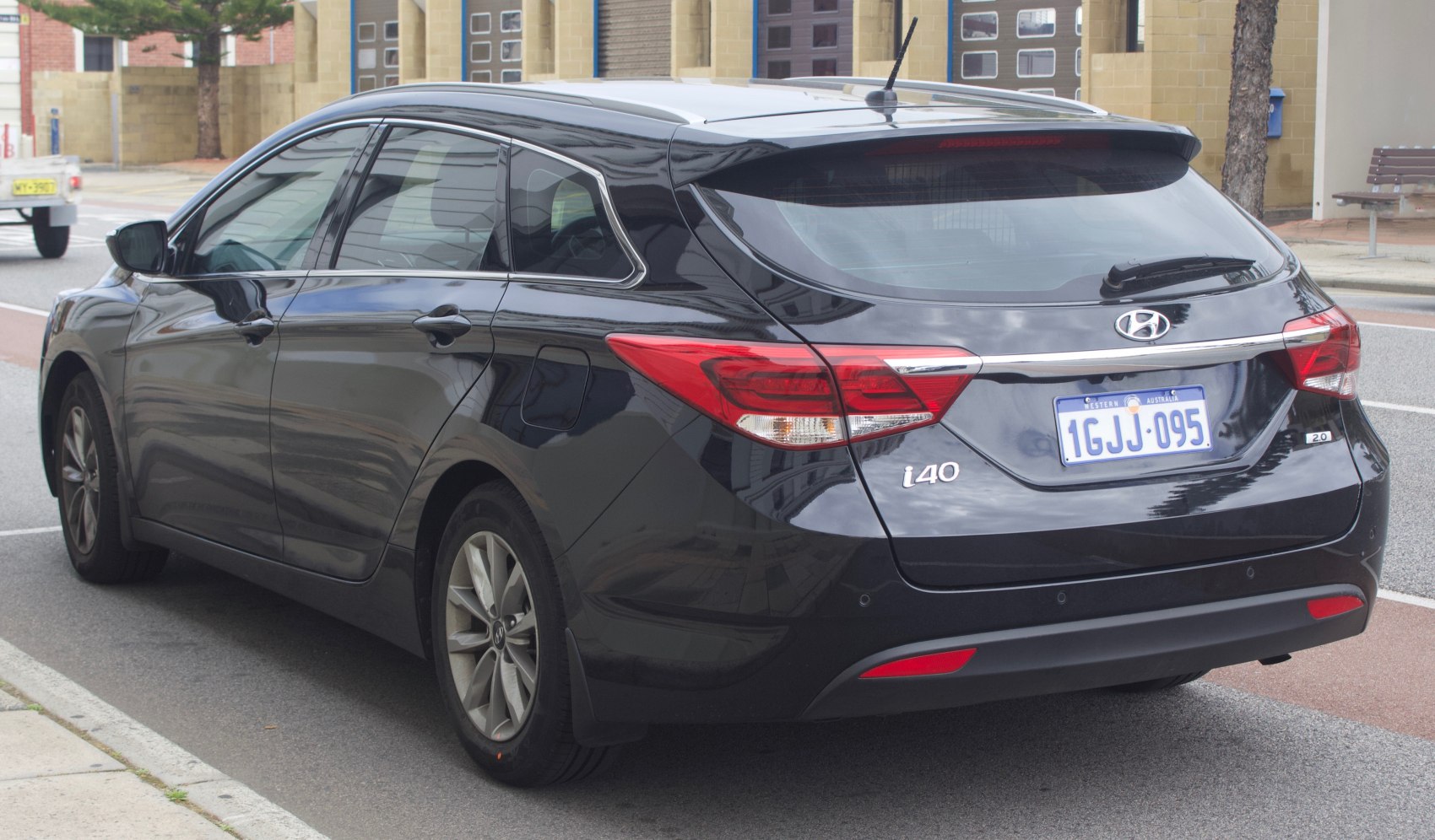 Rear view of station wagon showing taillights and rear hatch
