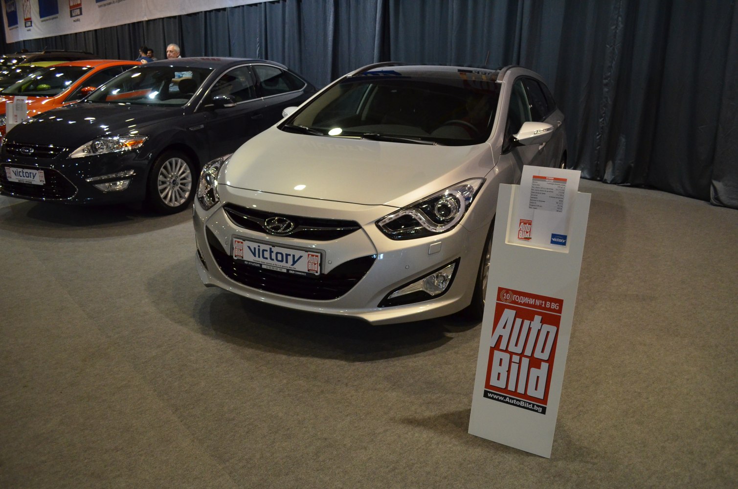 Front view with dynamic headlights and sleek grille design