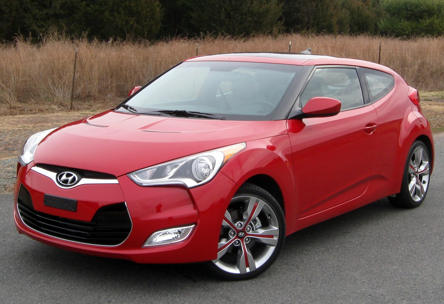 Front angle view of a sporty compact hatchback with unique design features.