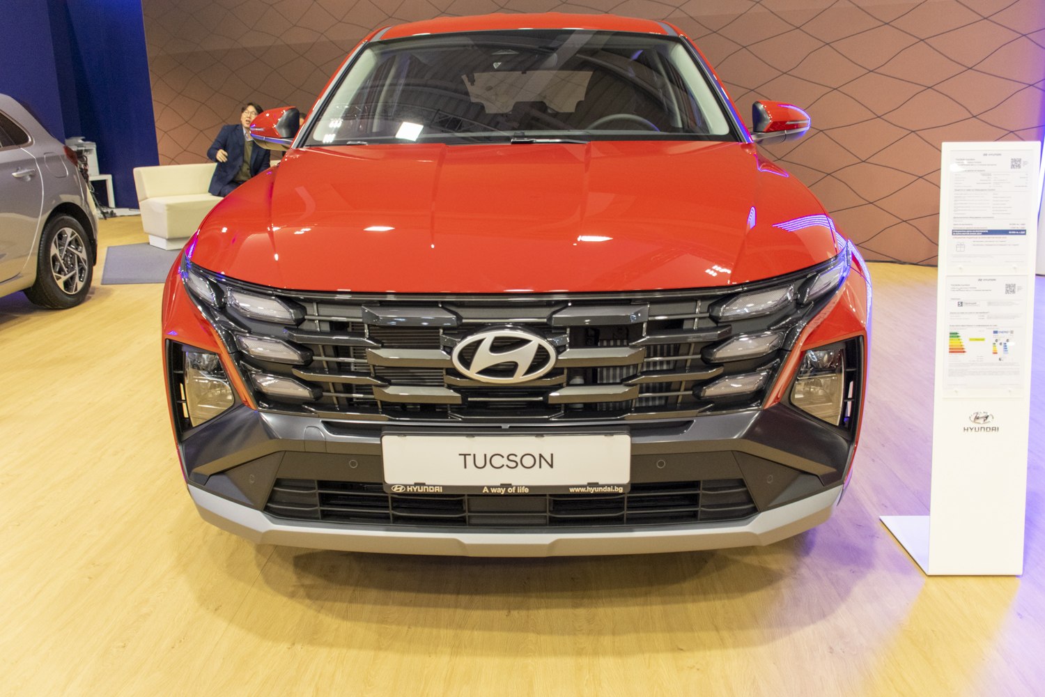 Front view of SUV with modern grille and sharp headlights