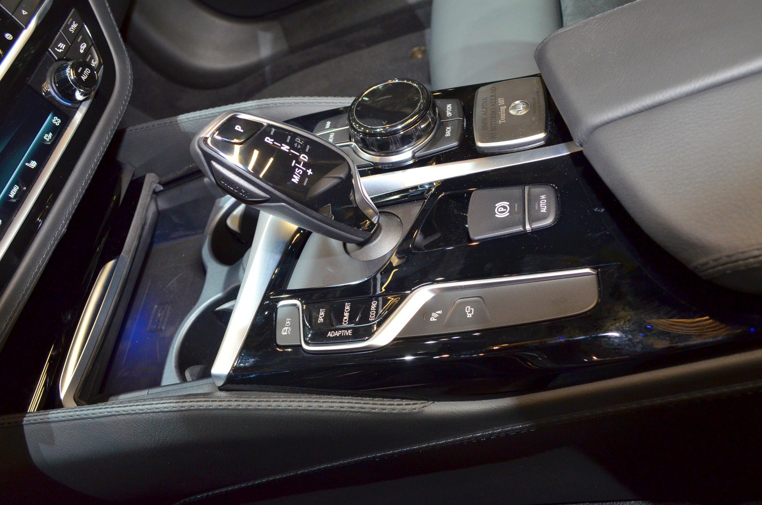 Gear shift lever and adaptive control panel with driving mode buttons