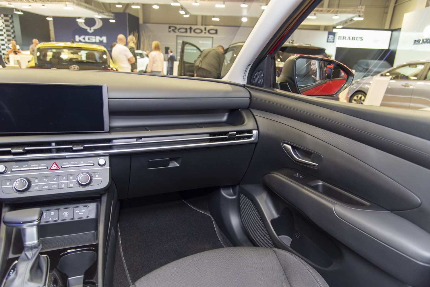 Modern dashboard and door panel with multimedia controls