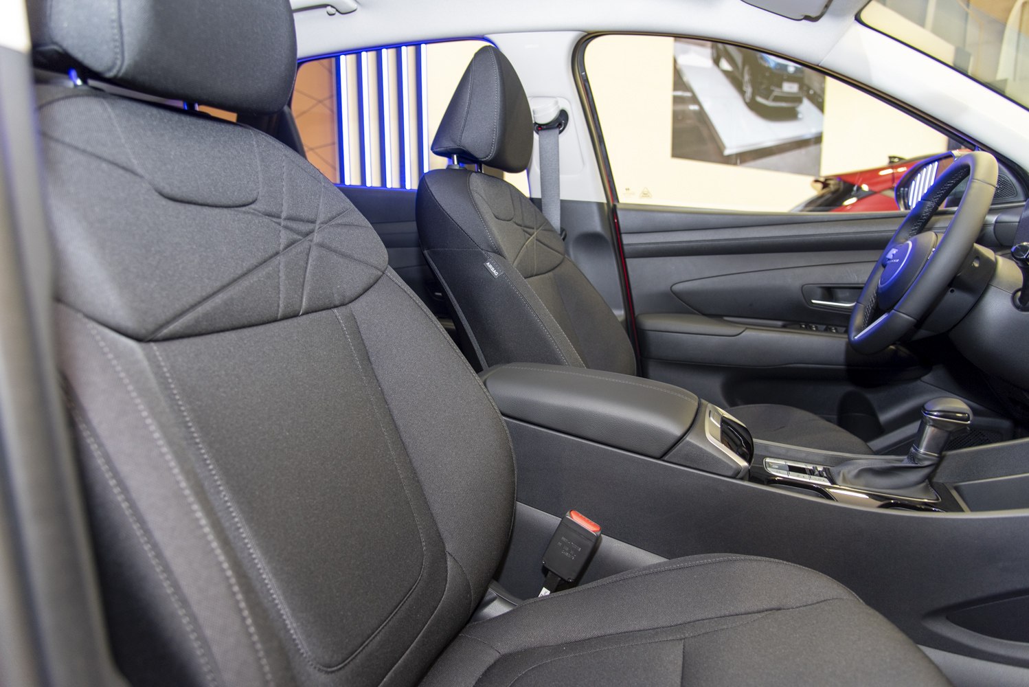Modern front seats and dashboard interior of a vehicle