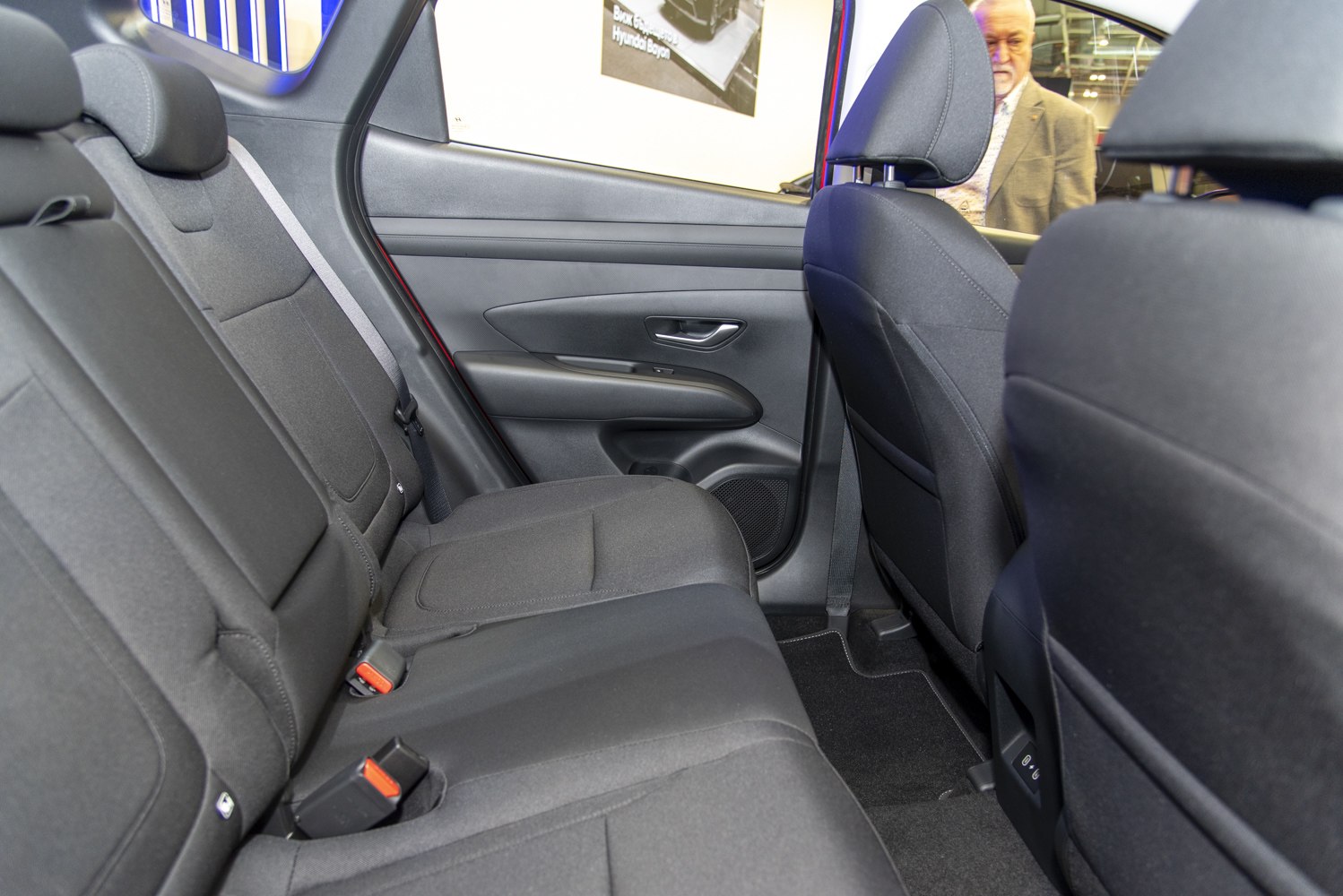 Spacious and practical rear seat interior with fabric upholstery and integrated headrests