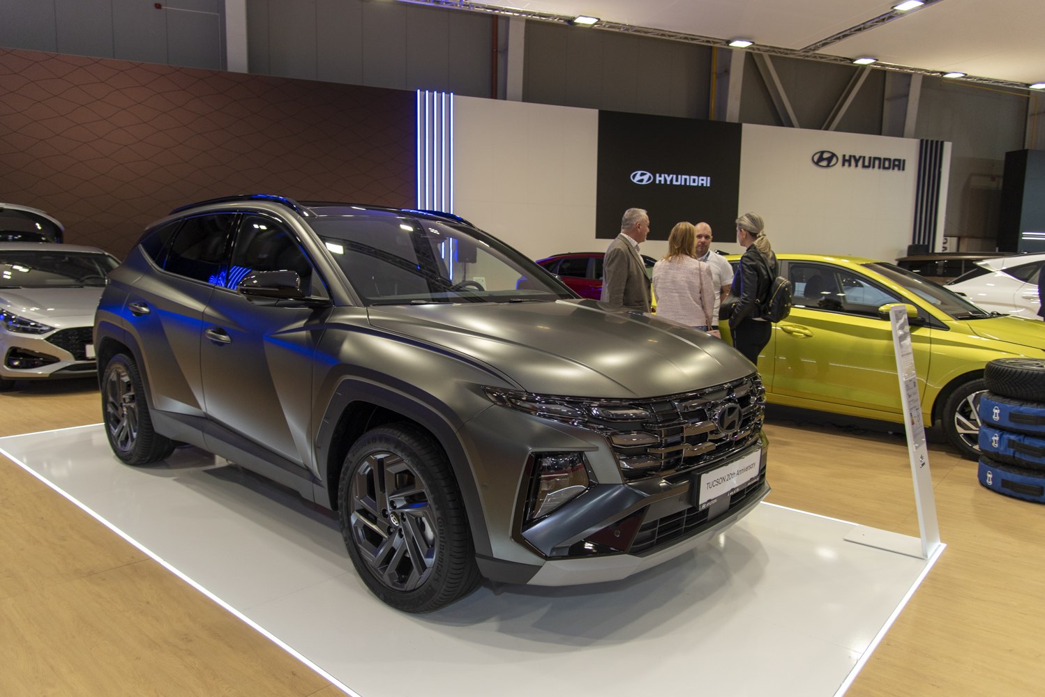 Matte gray SUV front with modern grille and headlights