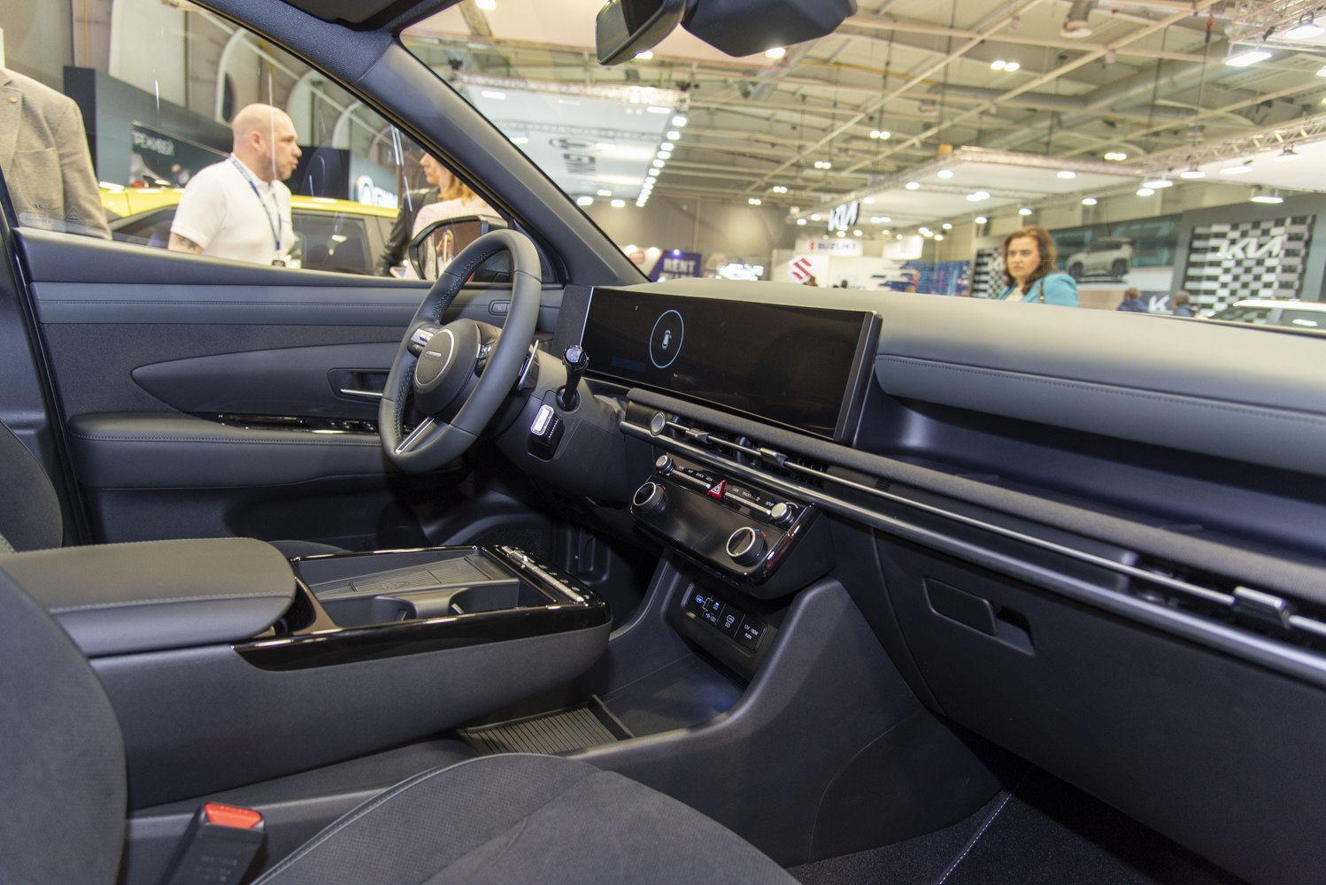 Modern car interior with large digital dashboard and minimalist control layout