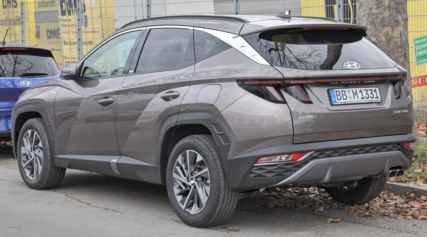 Rear view with LED tail lights and distinctive rear bumper styling