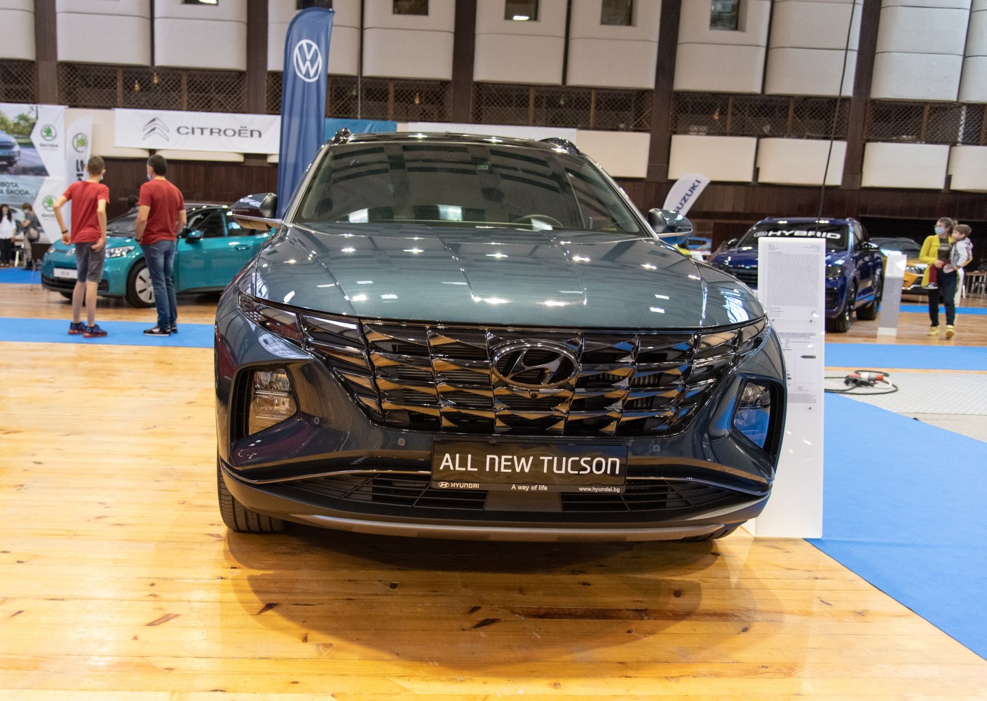 Front view with large grille and LED headlights