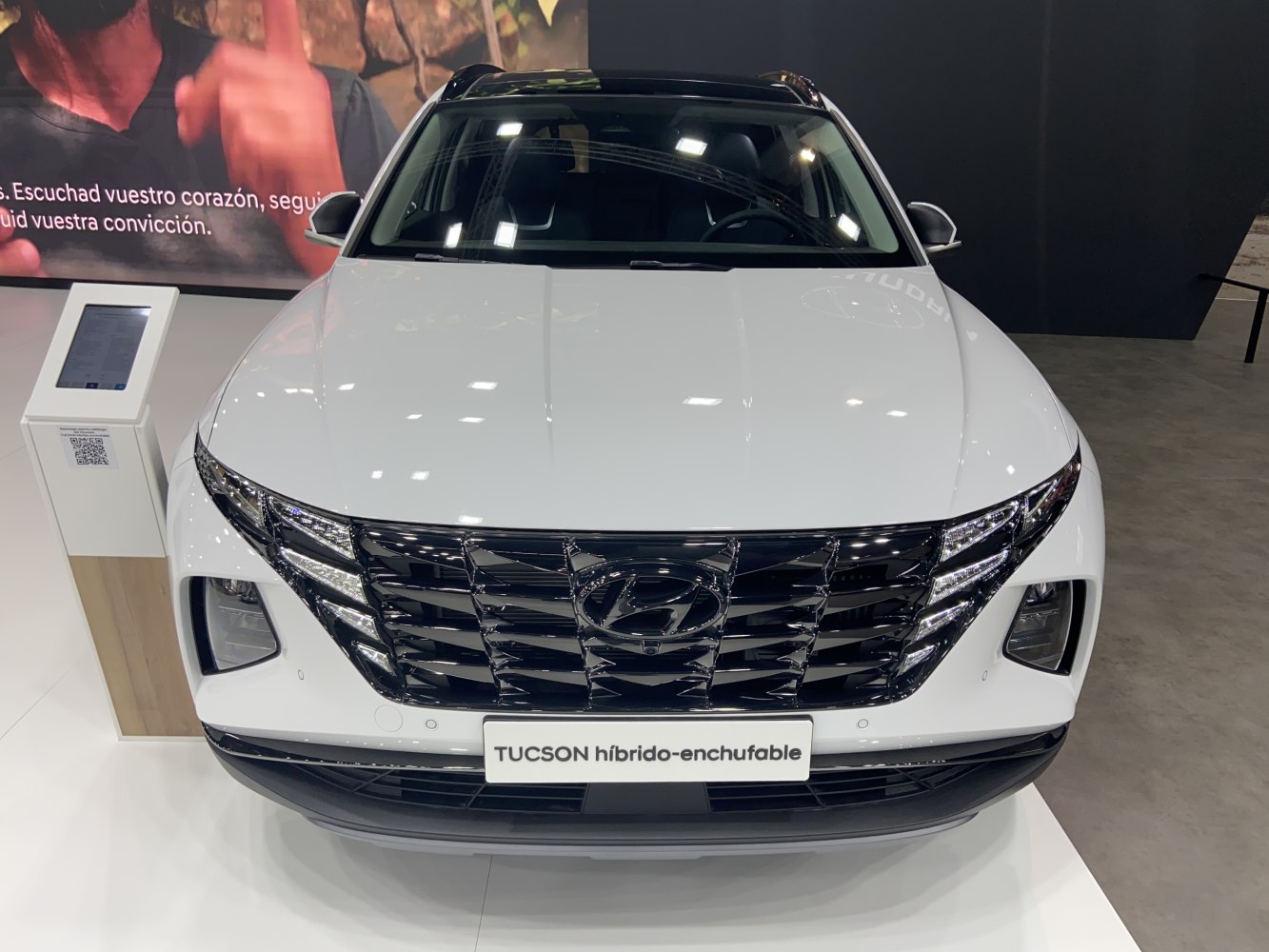 Front view with distinctive grille and sleek headlights.