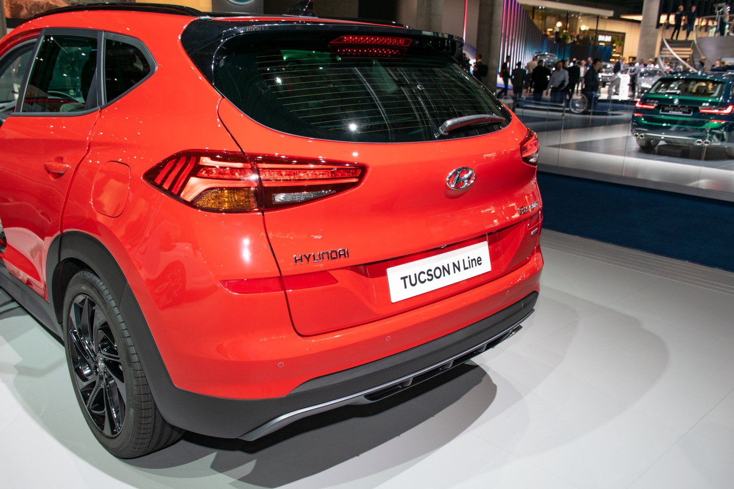 Rear view of an SUV focused on taillights and bumper details.