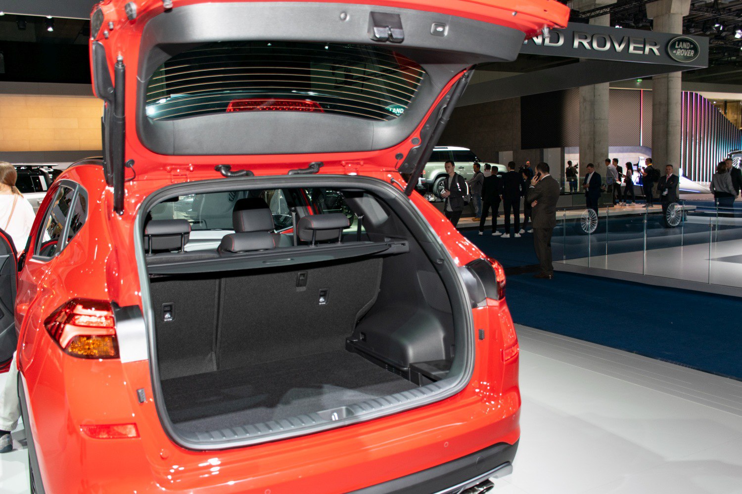 Open trunk with spacious cargo area and rear seats in view