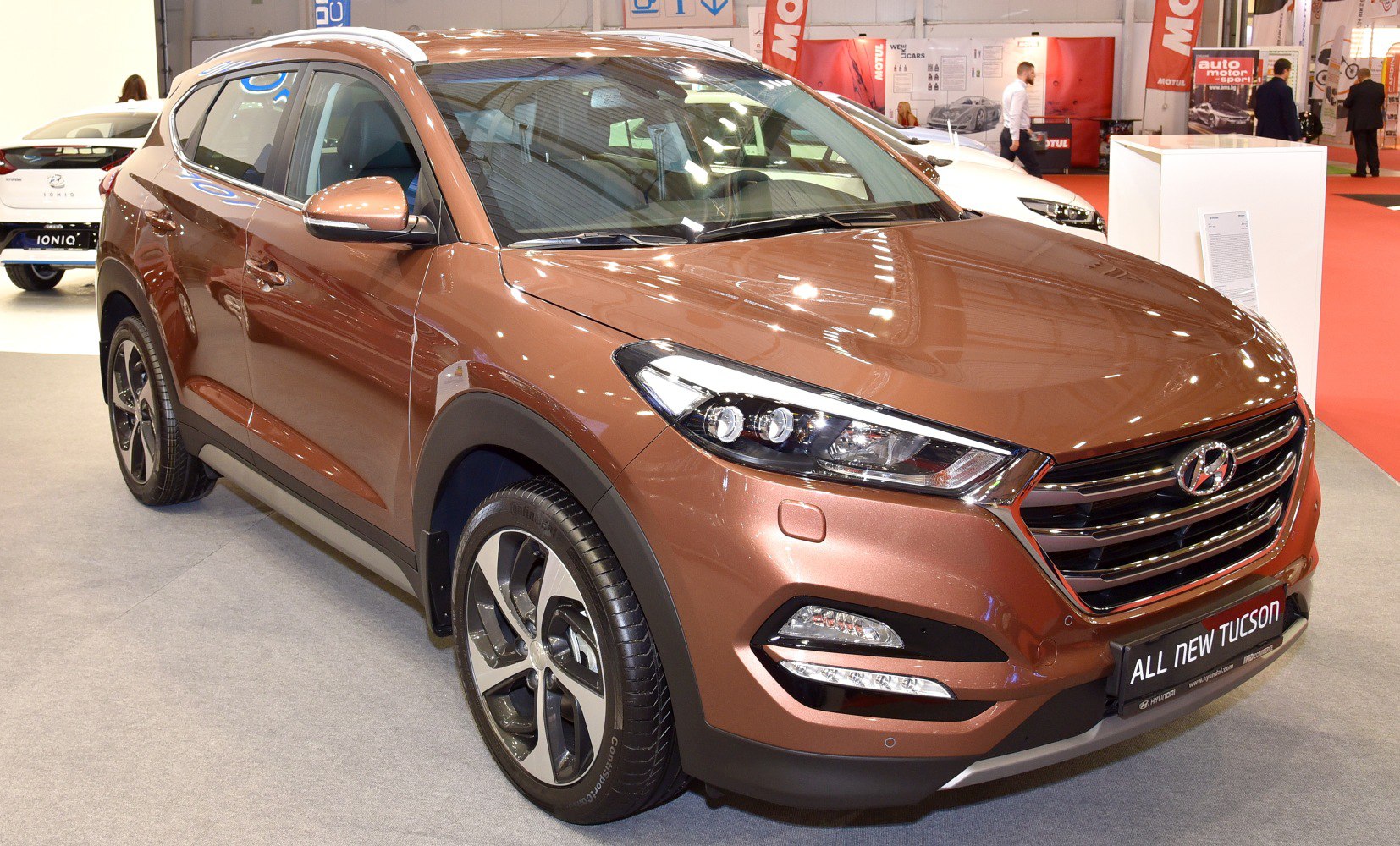Close-up of SUV front grille and headlight design
