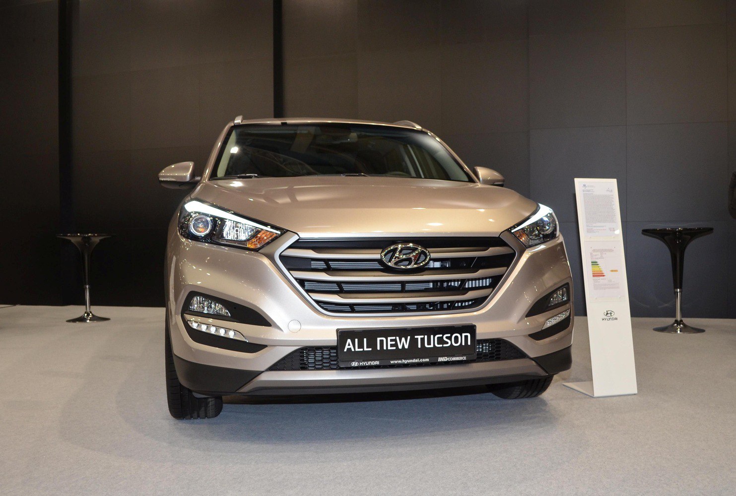 Front view with LED headlights and distinctive grille design.