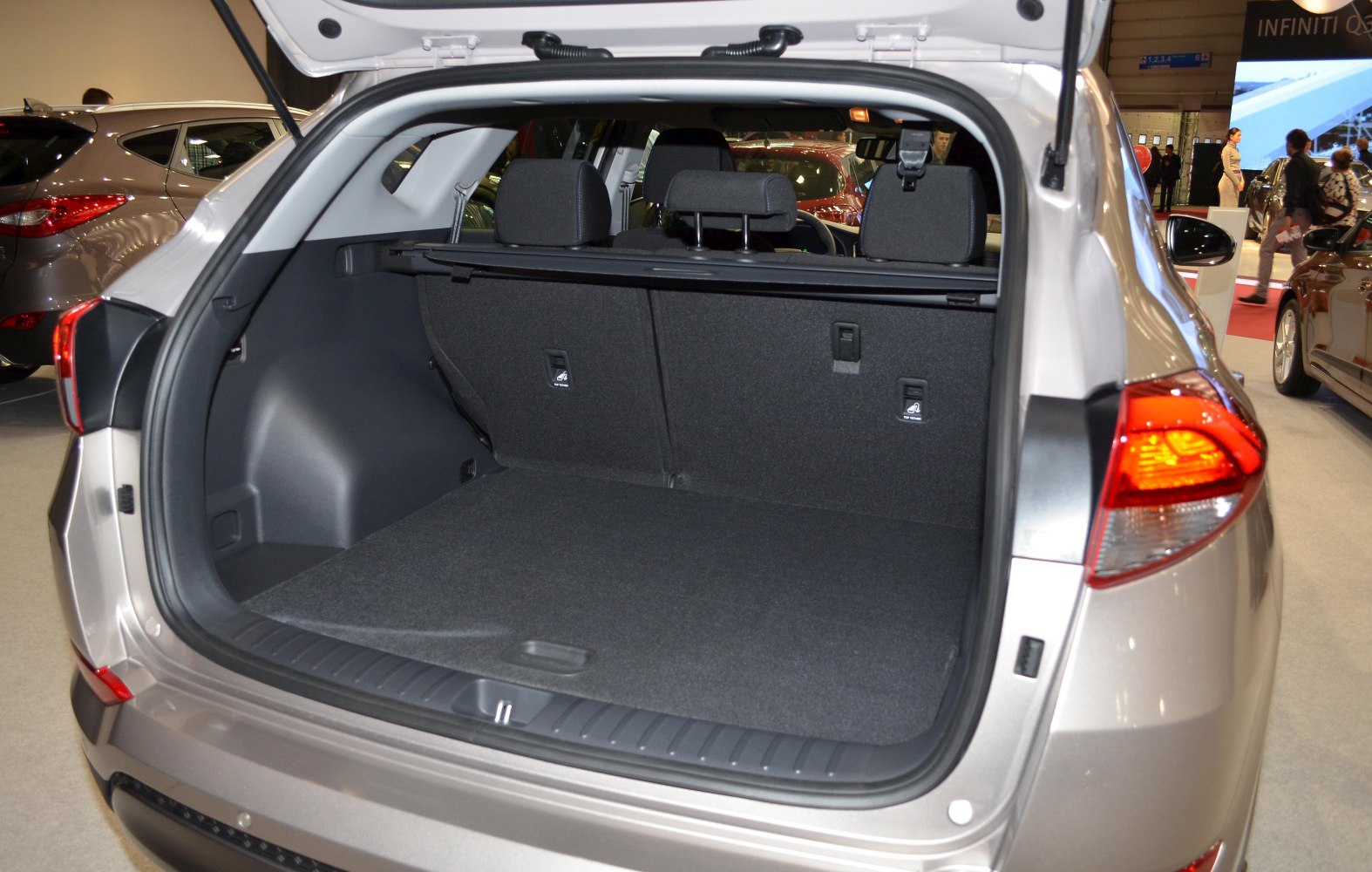SUV rear cargo area with open tailgate and spacious storage