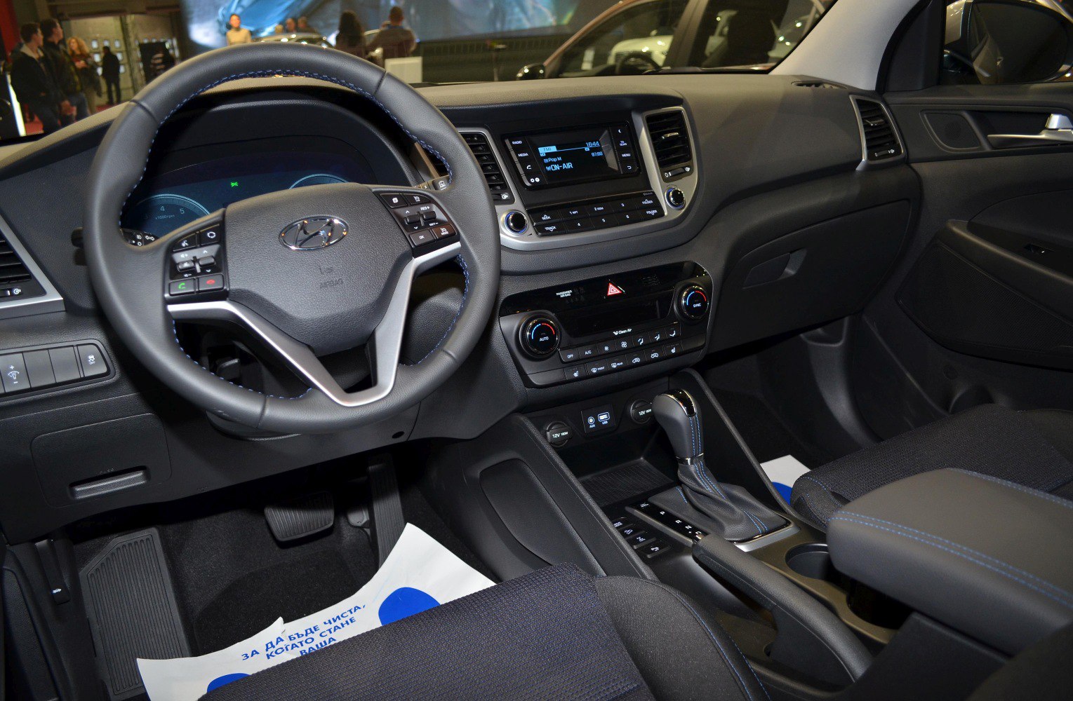 Dashboard, steering wheel, and center console showcasing car interior features