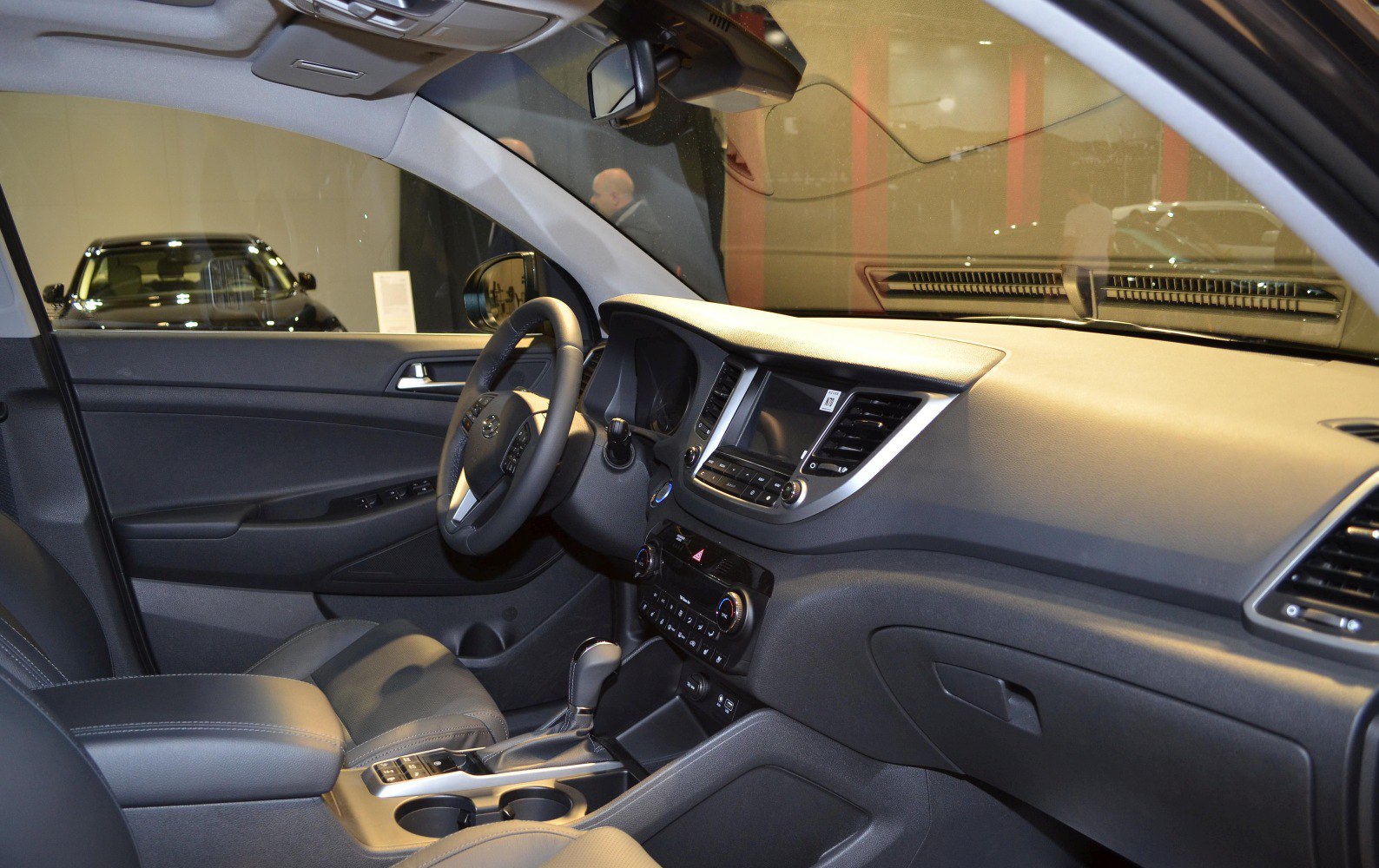 Modern car interior dashboard and center console with steering wheel