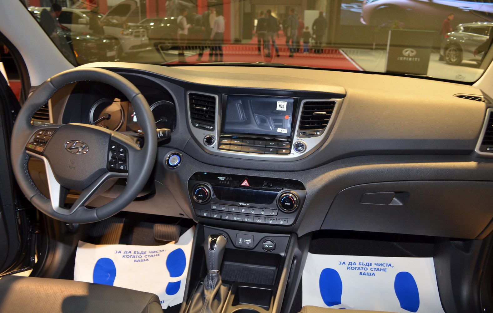 Dashboard, steering wheel, and center console layout of a car interior