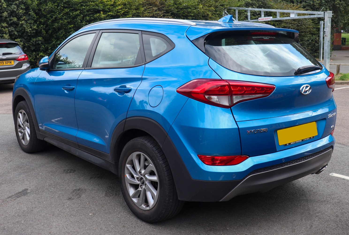 Side and rear view of a compact SUV with distinctive taillights