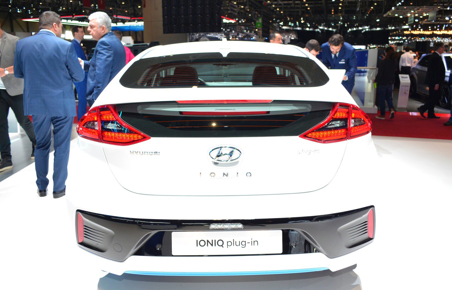 Rear view of hybrid hatchback with distinctive taillights and black bumper accents