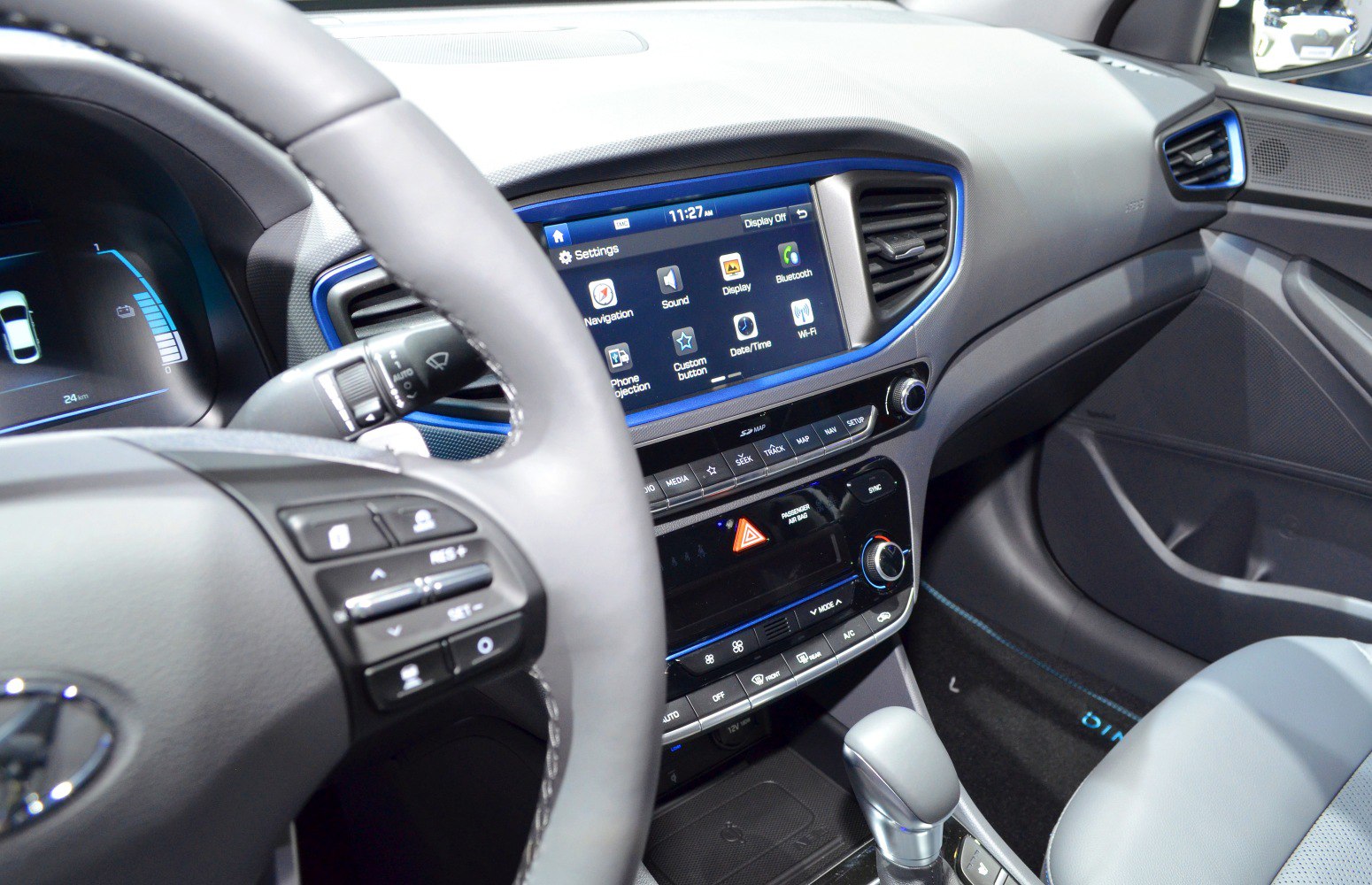 Digital dashboard and central touchscreen infotainment system with climate controls