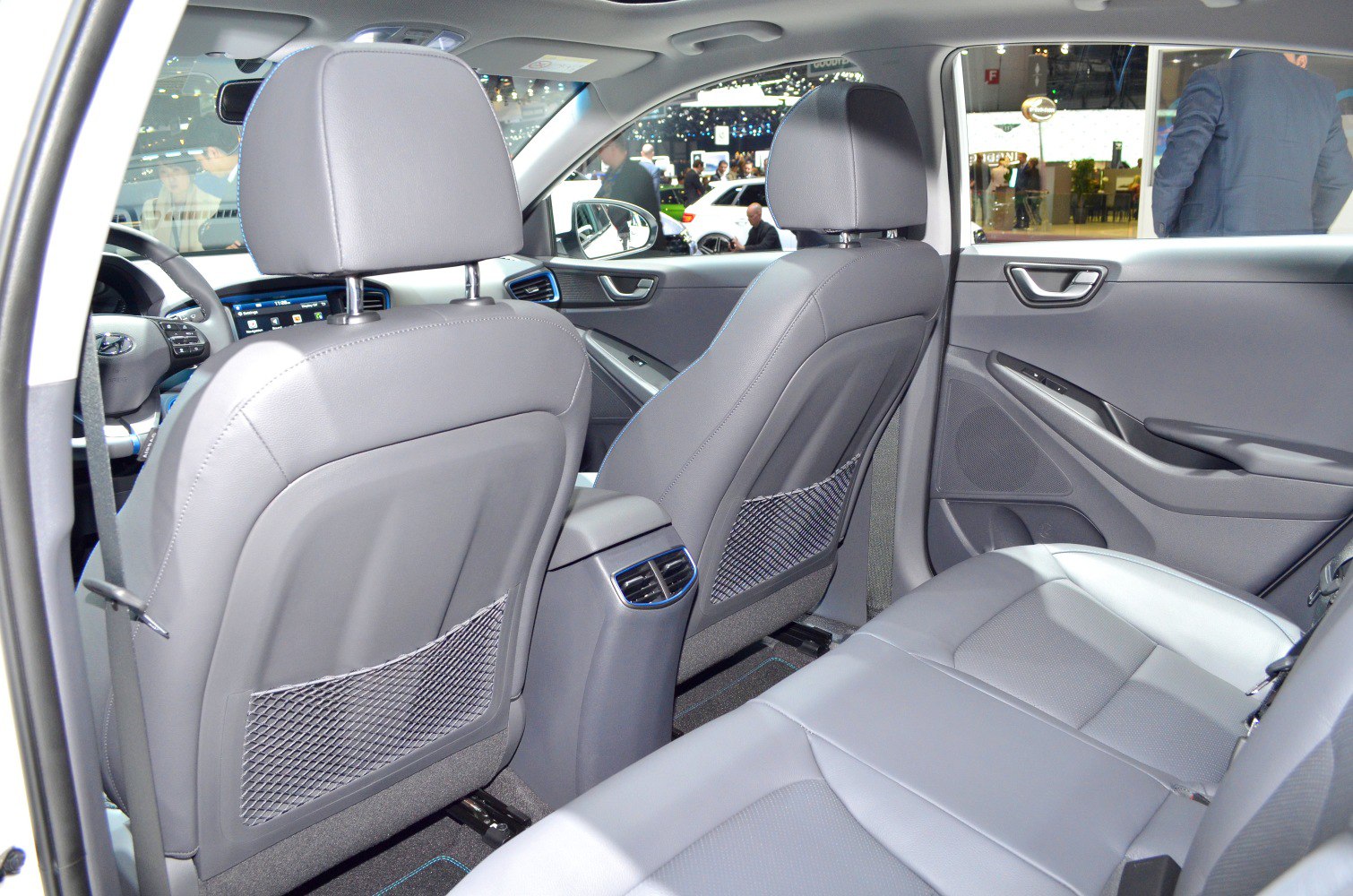 Rear seating area with air vents and leather upholstery