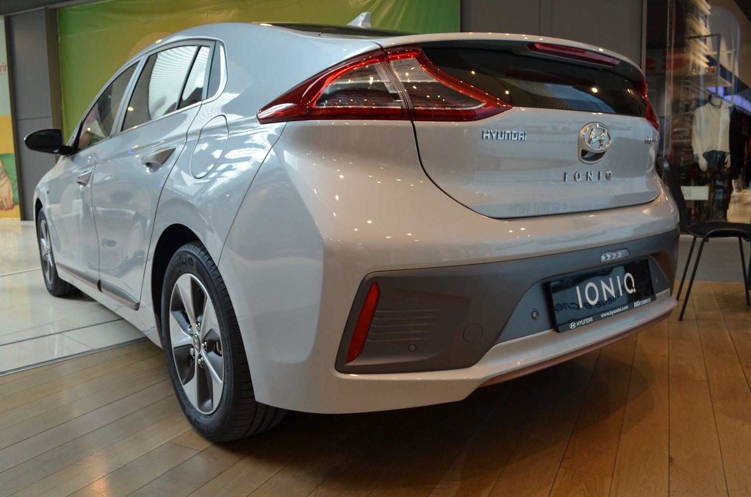 Rear view showing hatchback body and LED taillights.