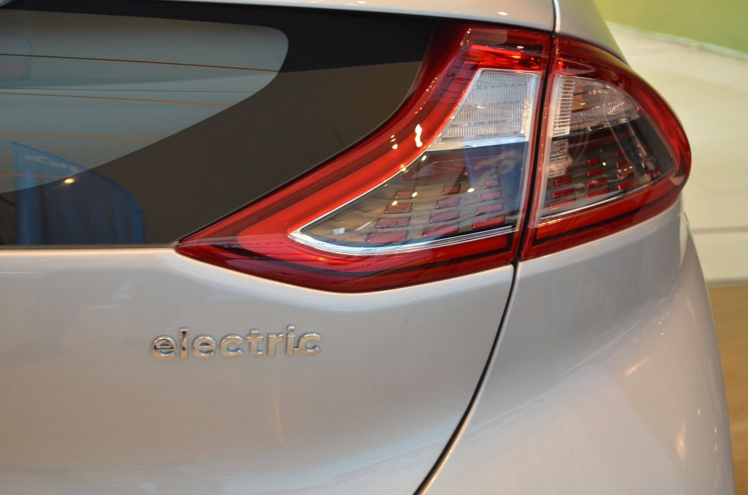 Close-up of rear tail light and electric badge