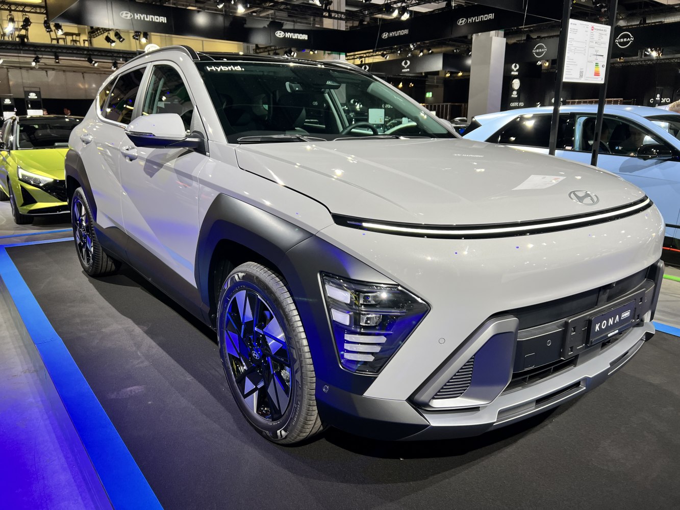Futuristic hybrid SUV front exterior with distinctive headlight design.