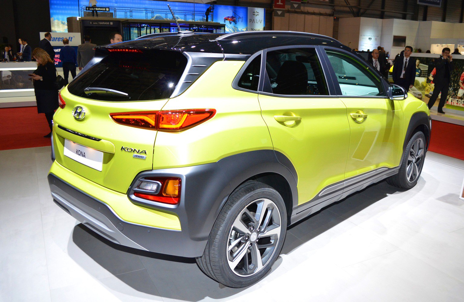 Rear side view with distinct taillights and dual-tone body