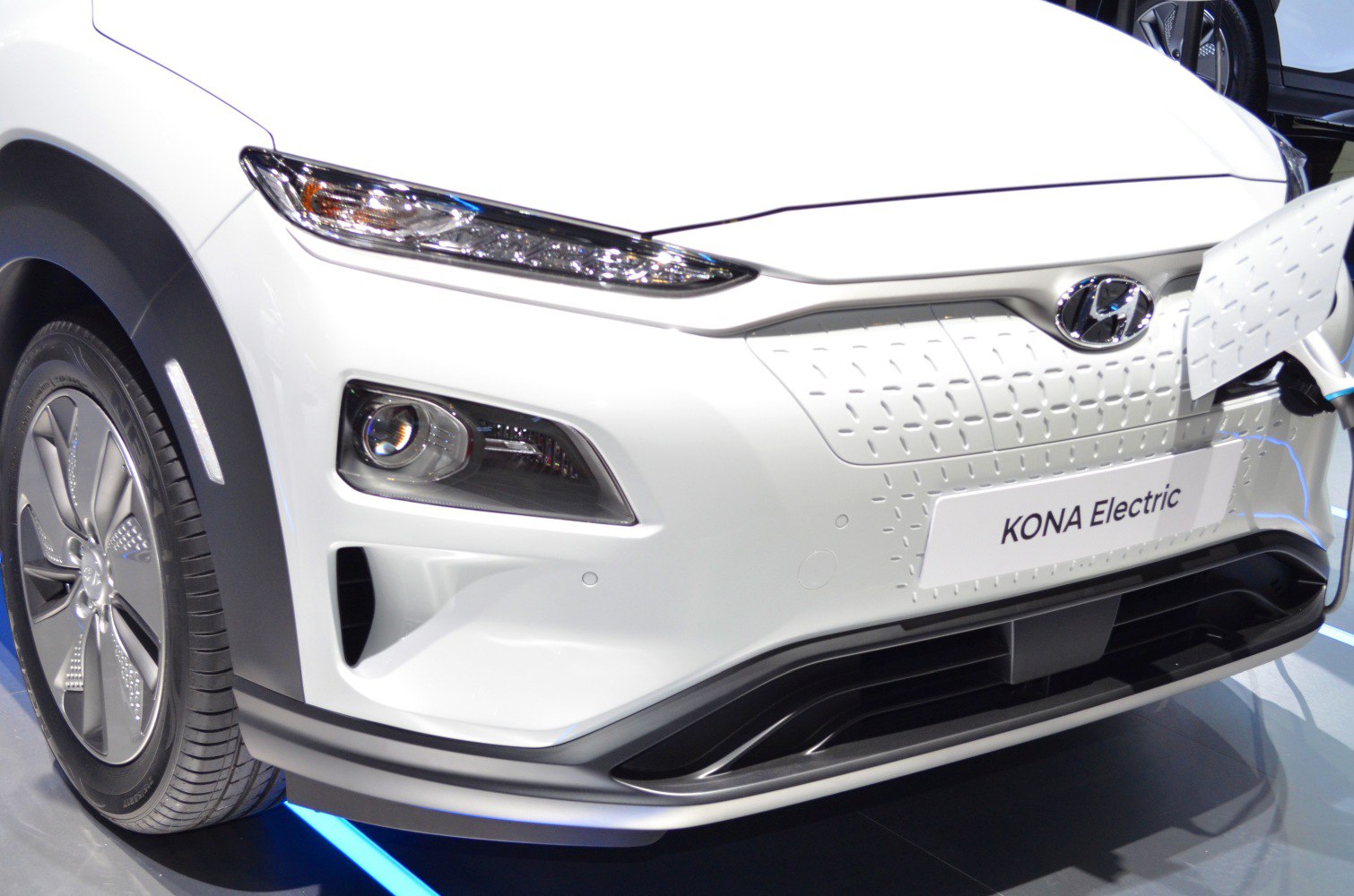 Front close-up with LED headlights and electric charging port