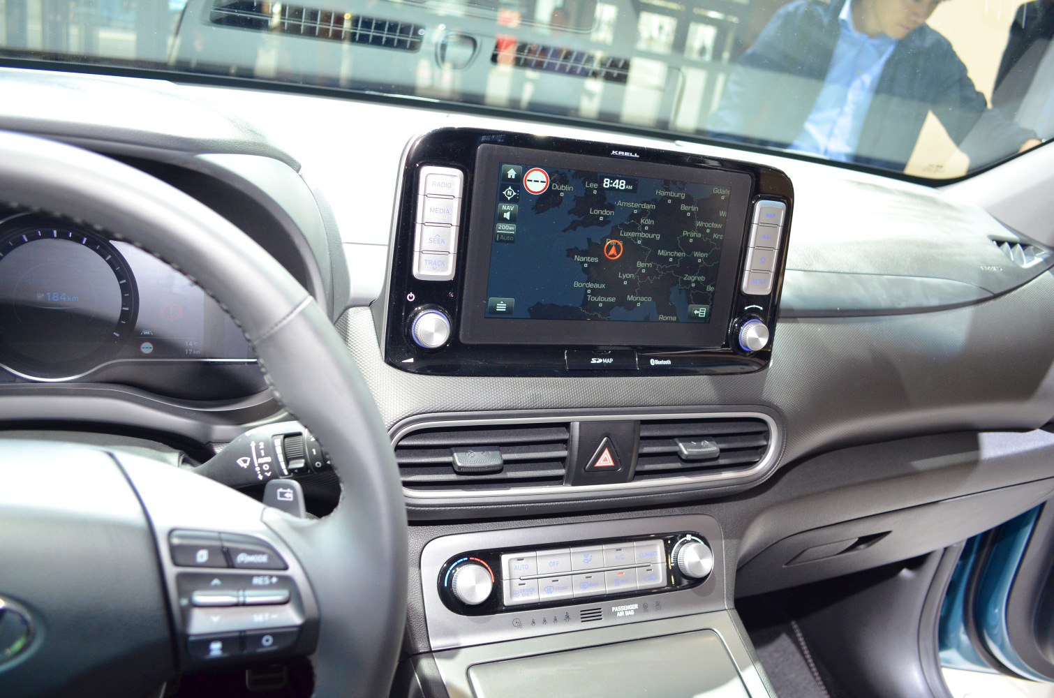 Touchscreen navigation system and dual climate control with central air vents