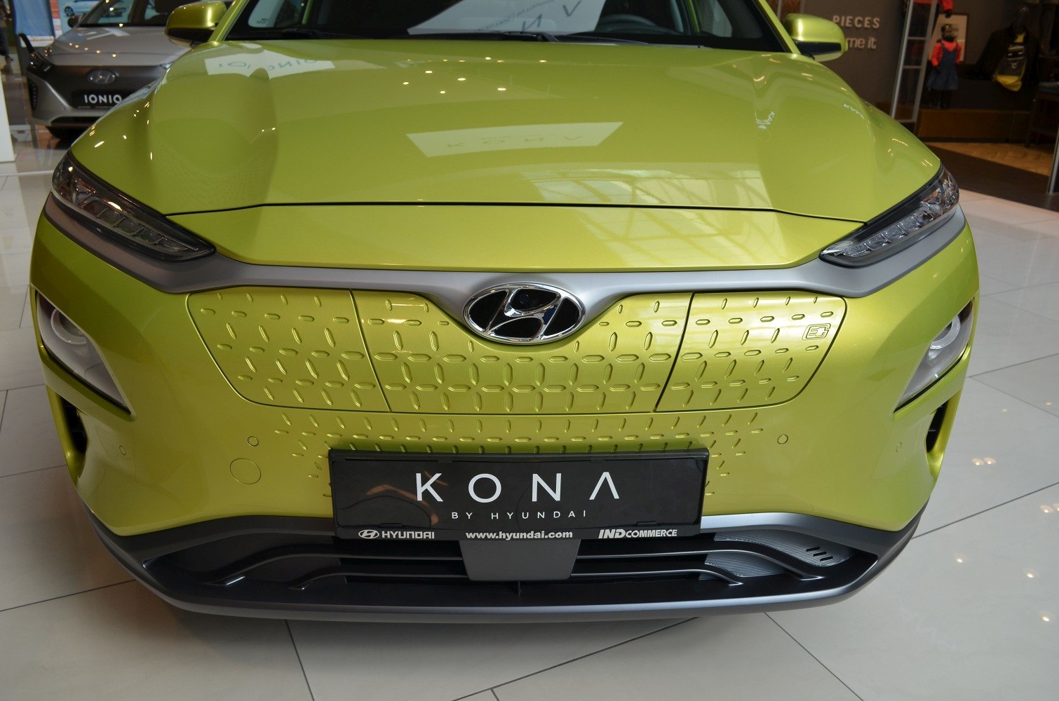 Front grille and LED headlights of an electric compact SUV