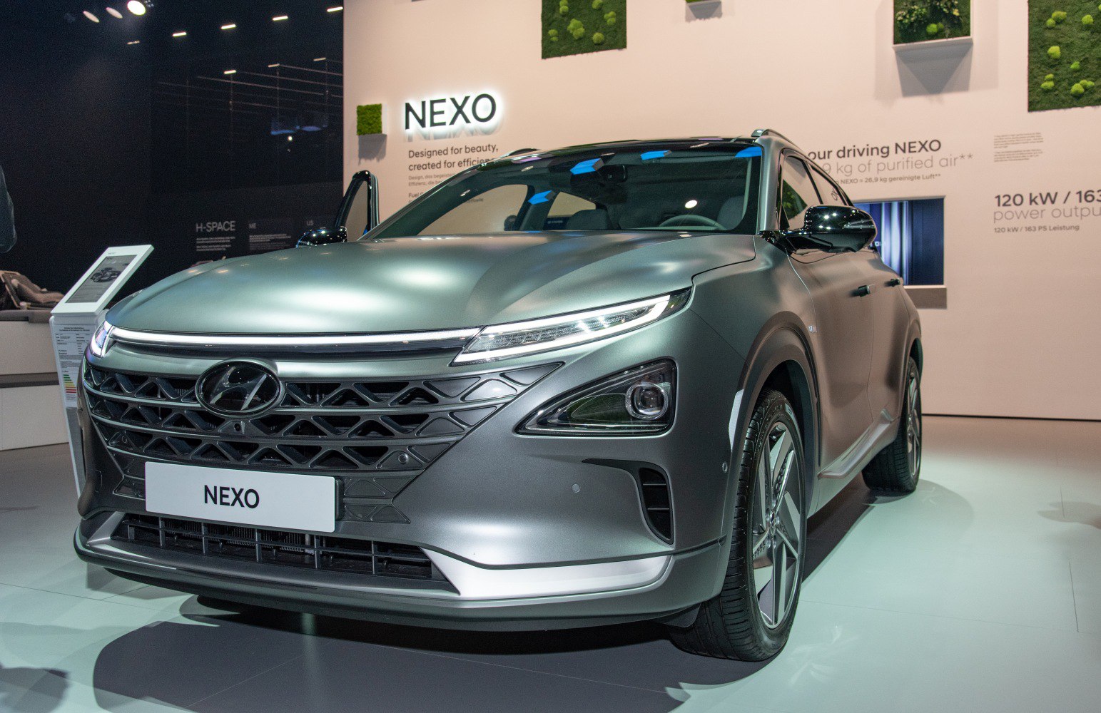 Front view with distinctive grille and sharp LED headlights