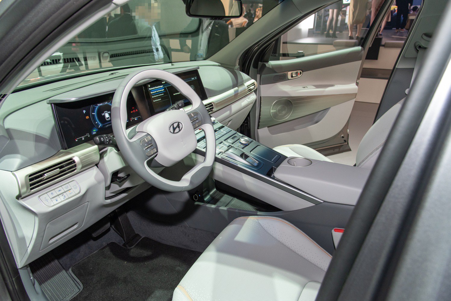 Digital dashboard and unique steering wheel in modern car interior