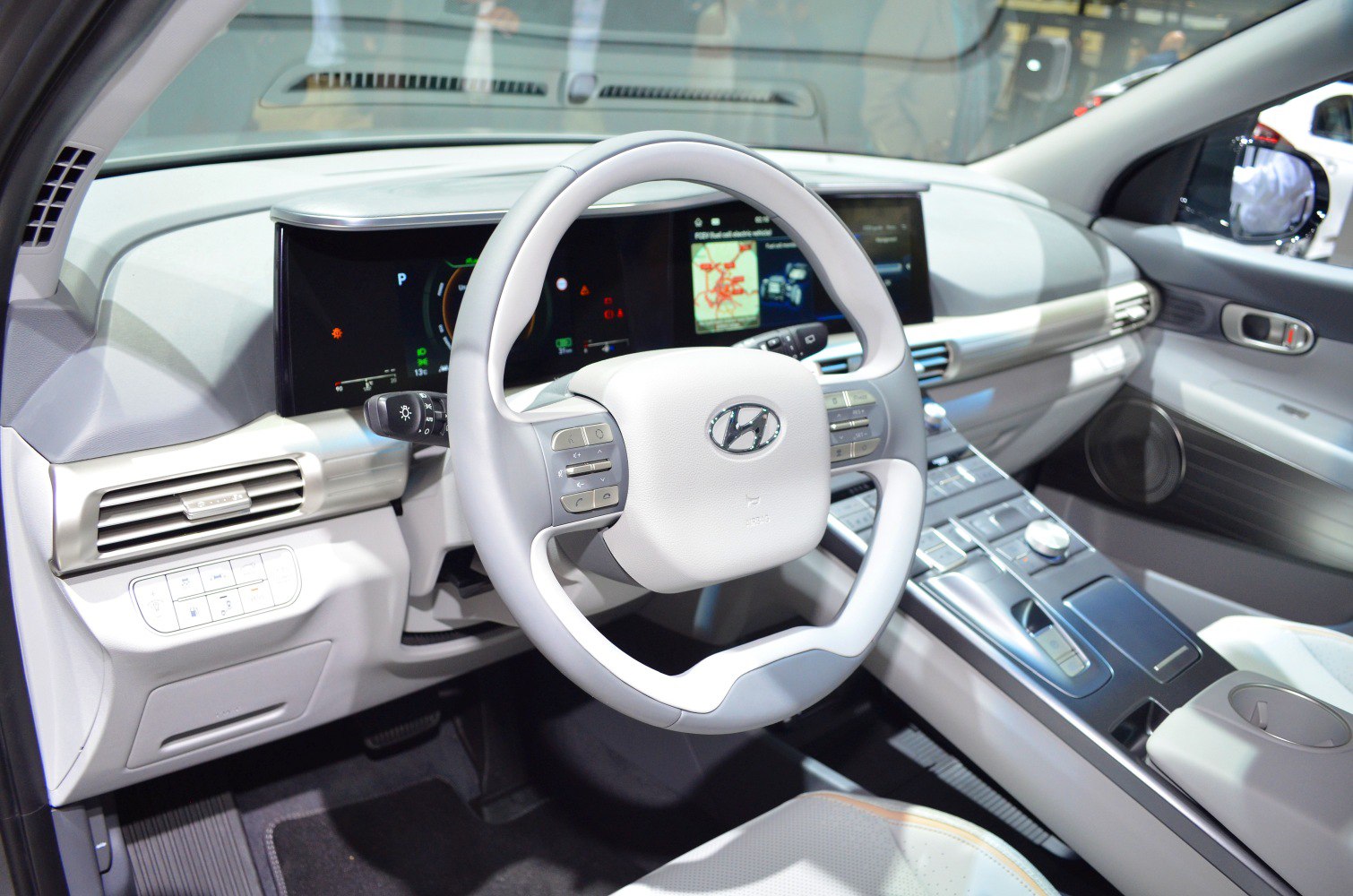 Futuristic digital dashboard and innovative steering wheel design