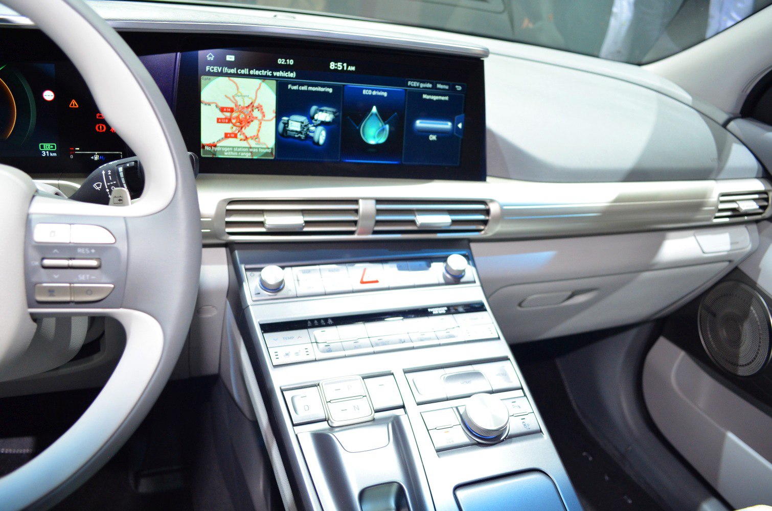 Modern digital dashboard and control panel with steering wheel buttons