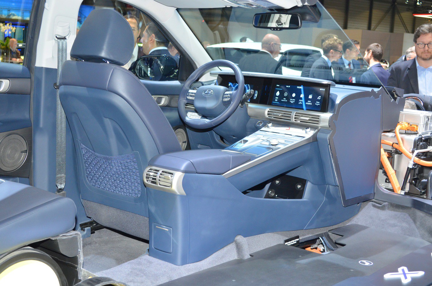 Modern car interior with digital dashboard and advanced steering wheel
