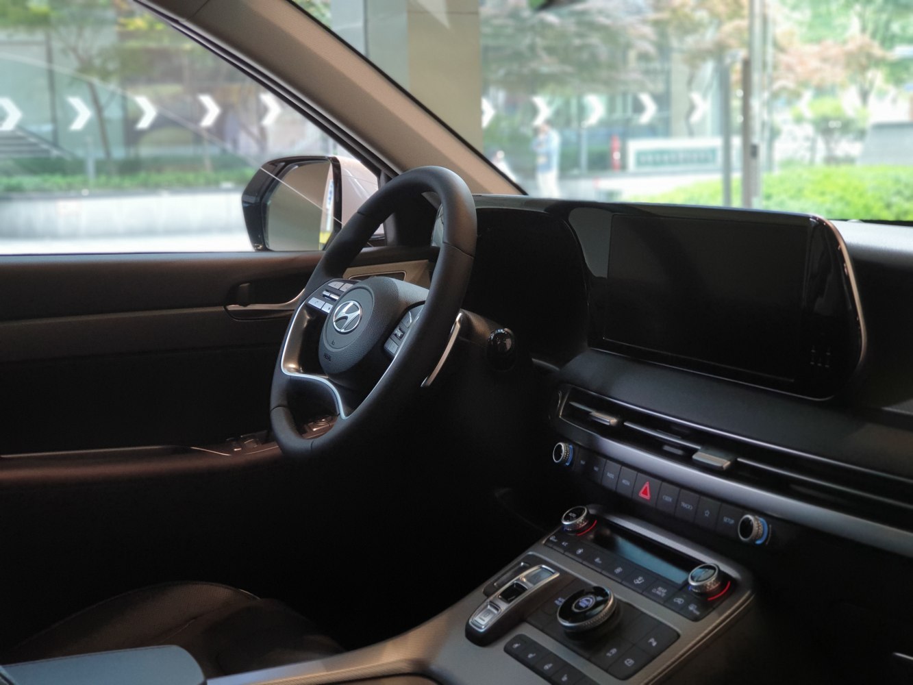 Modern SUV interior dashboard and multifunction steering wheel
