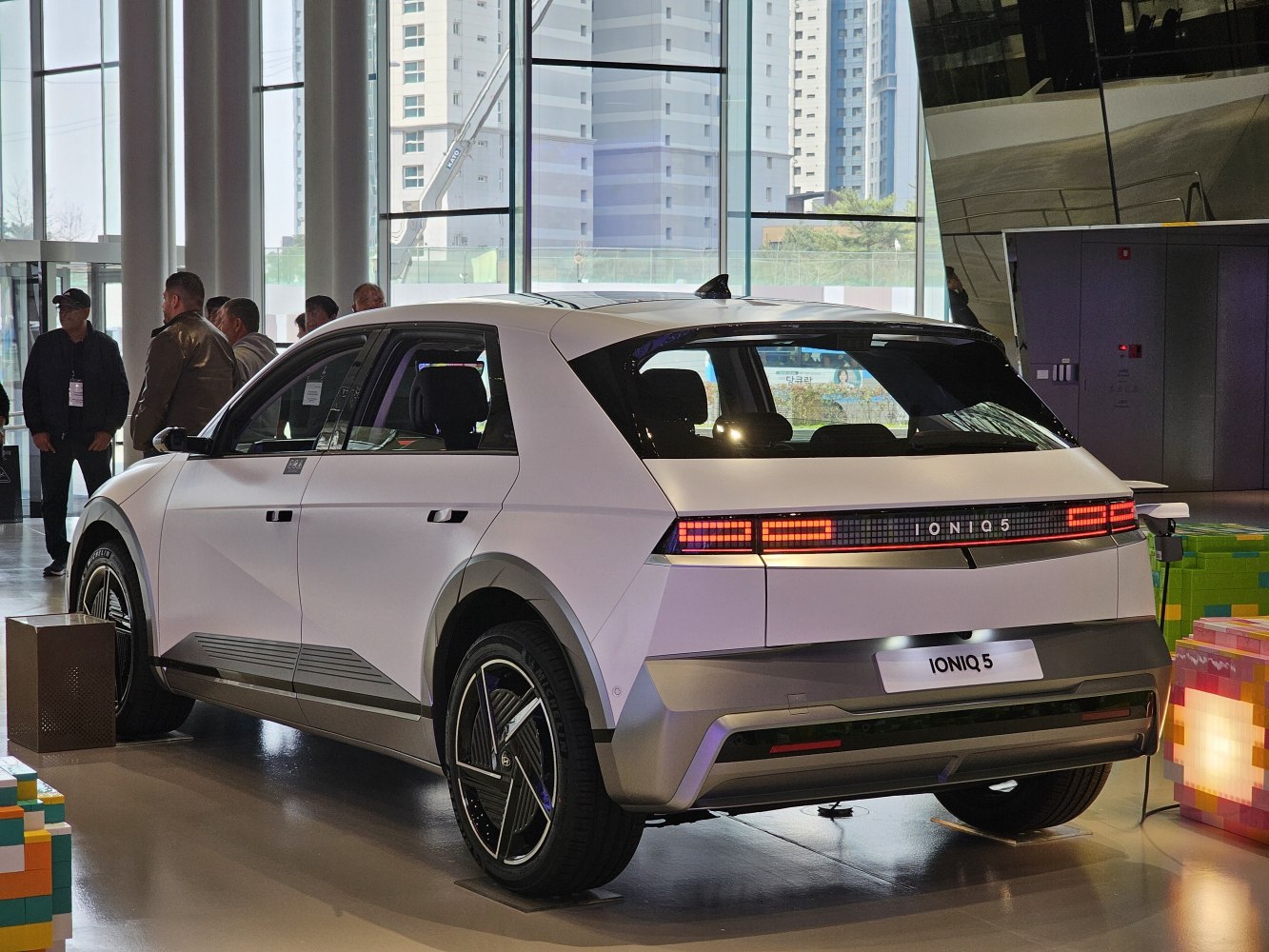 Rear view of a modern hatchback with distinctive LED taillights and geometric design.
