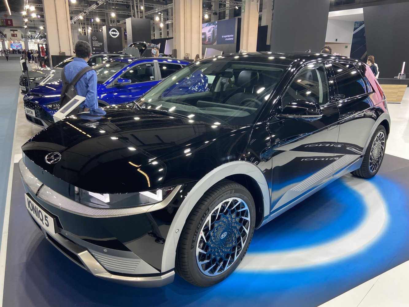 Futuristic electric SUV with LED headlights and intricate alloy wheels