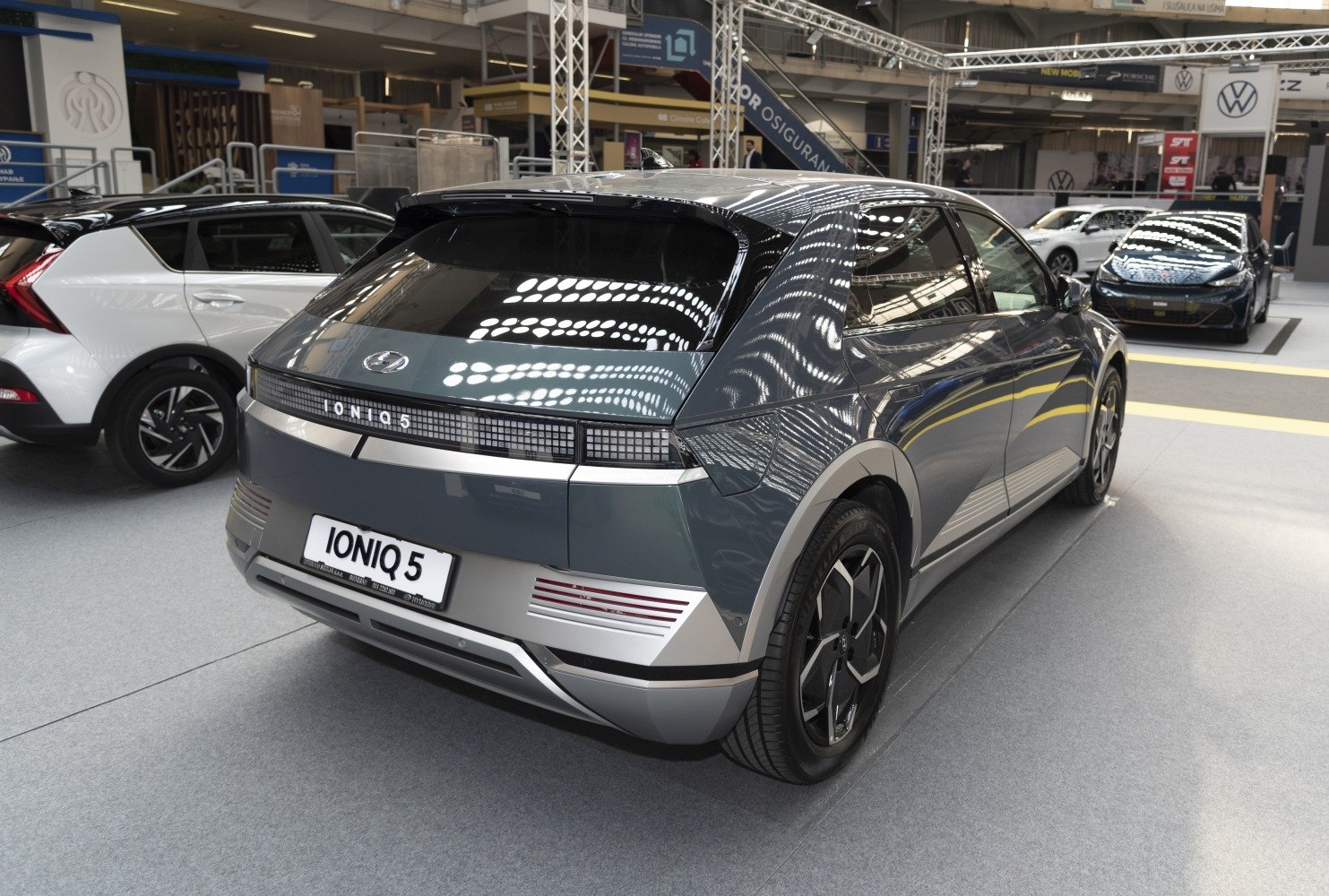 Rear view of electric SUV with pixelated taillights and sharp geometric design