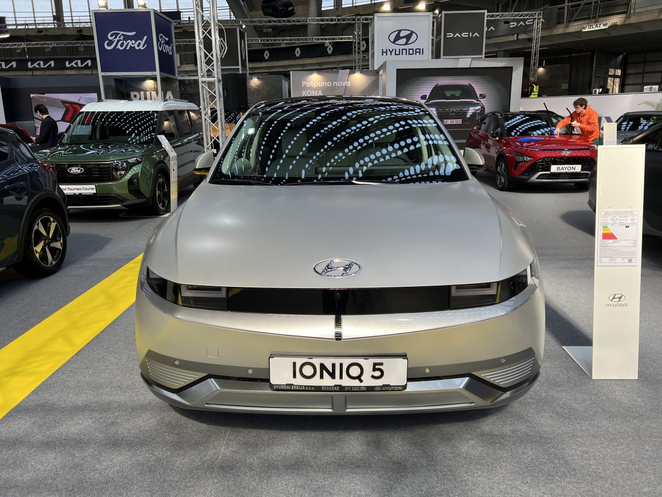 Front view with sleek headlights and futuristic grill design