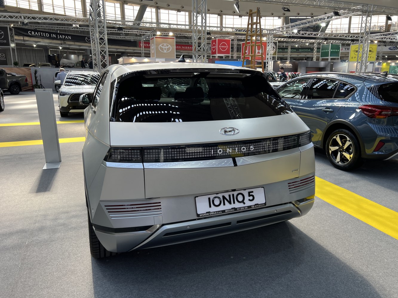 Rear view with pixel LED taillights and modern hatchback design