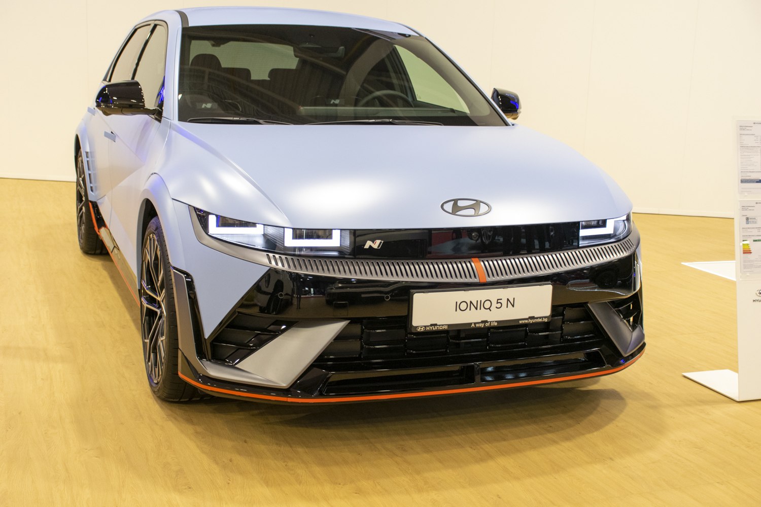 Close-up of front view with LED headlights and aerodynamic design