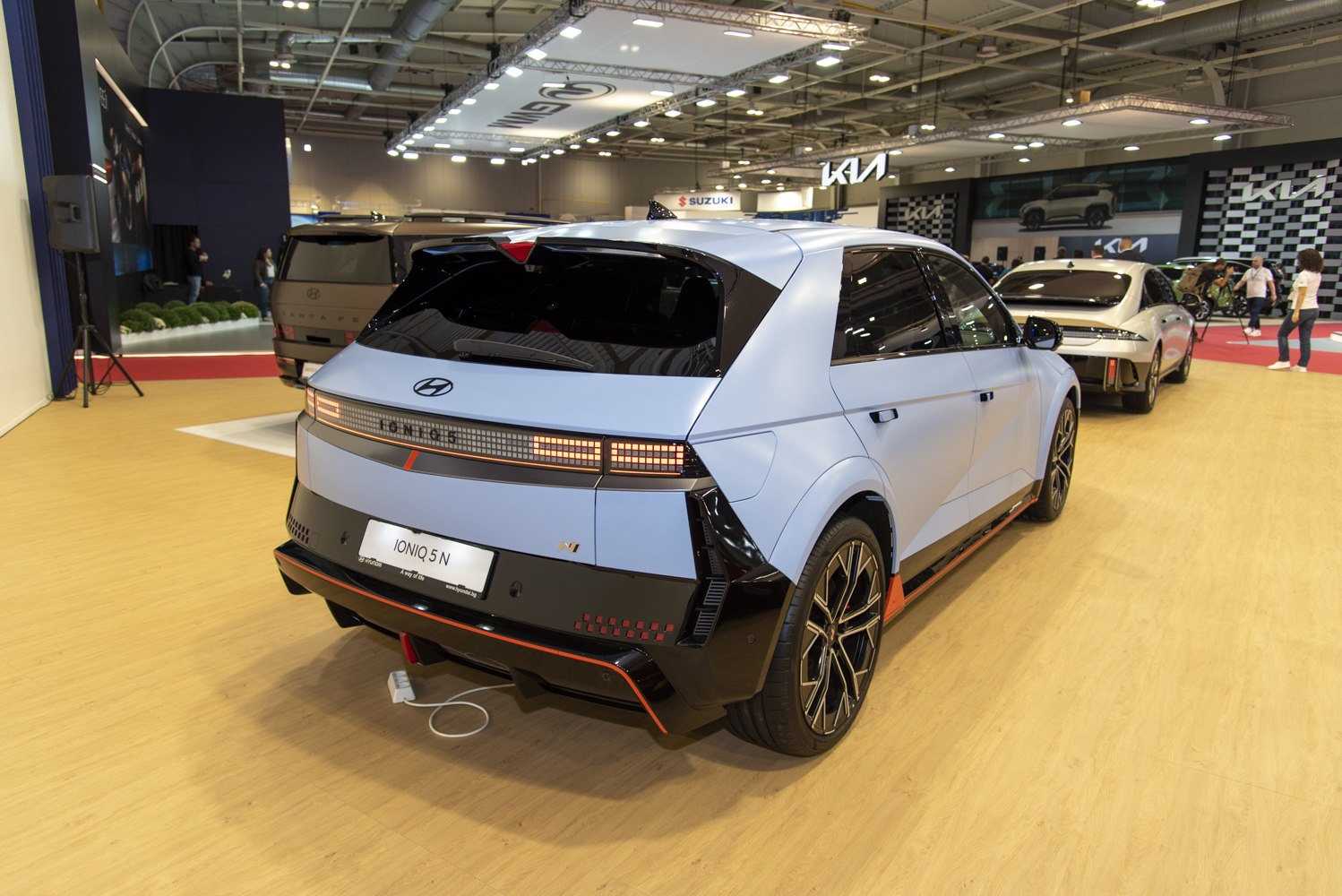 Rear view of electric SUV with pixel LED taillights and sporty design